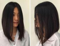 Long bob with elongated front strands Features of a haircut with oblique bangs